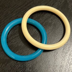 Vintage blue glass bangle and cream plastic bangle bracelets